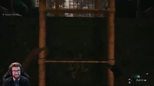 Aidan climbing the first ladder beneath a barred platform during Escape Charlotte